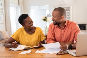 African American couple review finances_small