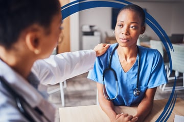 Female Physician Comforting Resident Blue Brushstroke