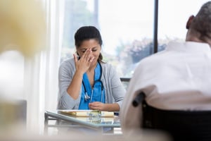 Female doc severely stressed tired