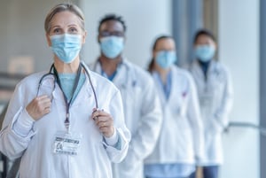 Female physician_blurred physicians background_masks_small