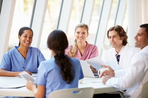 Healthcare team eating lunch_smiling