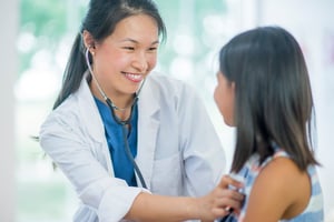 Female-Doctor-Happy-With-Patient-Care