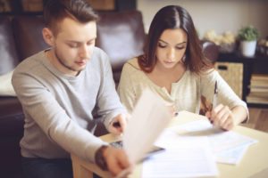 Young couple reviewing finances