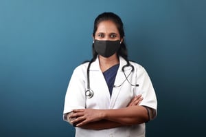 Indian female doctor smiling-mask on_small