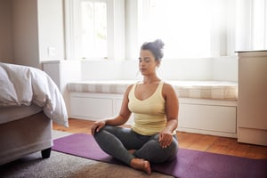 young woman yoga at home