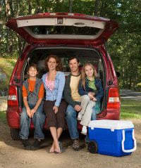family unplugging camping