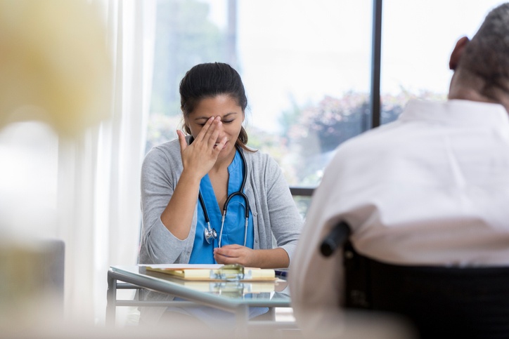 Female doc severely stressed tired_small