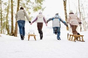 Family pulling sled